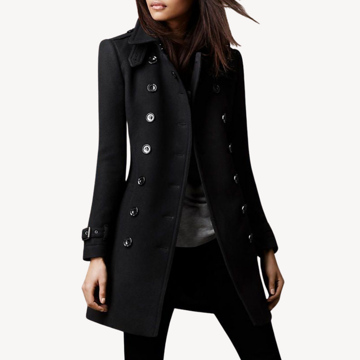 Stylish women's double-breasted wool peacoat. Classic elegant mid-length outerwear, a warm winter jacket.