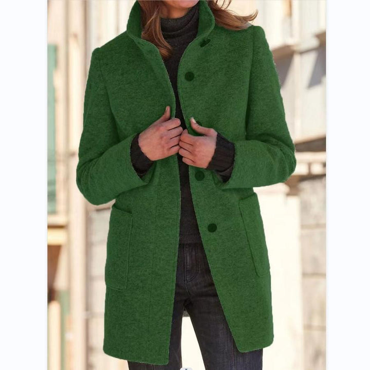 Retro style women's classic trench coat. Button closure, wool blend, elegant outerwear for autumn.