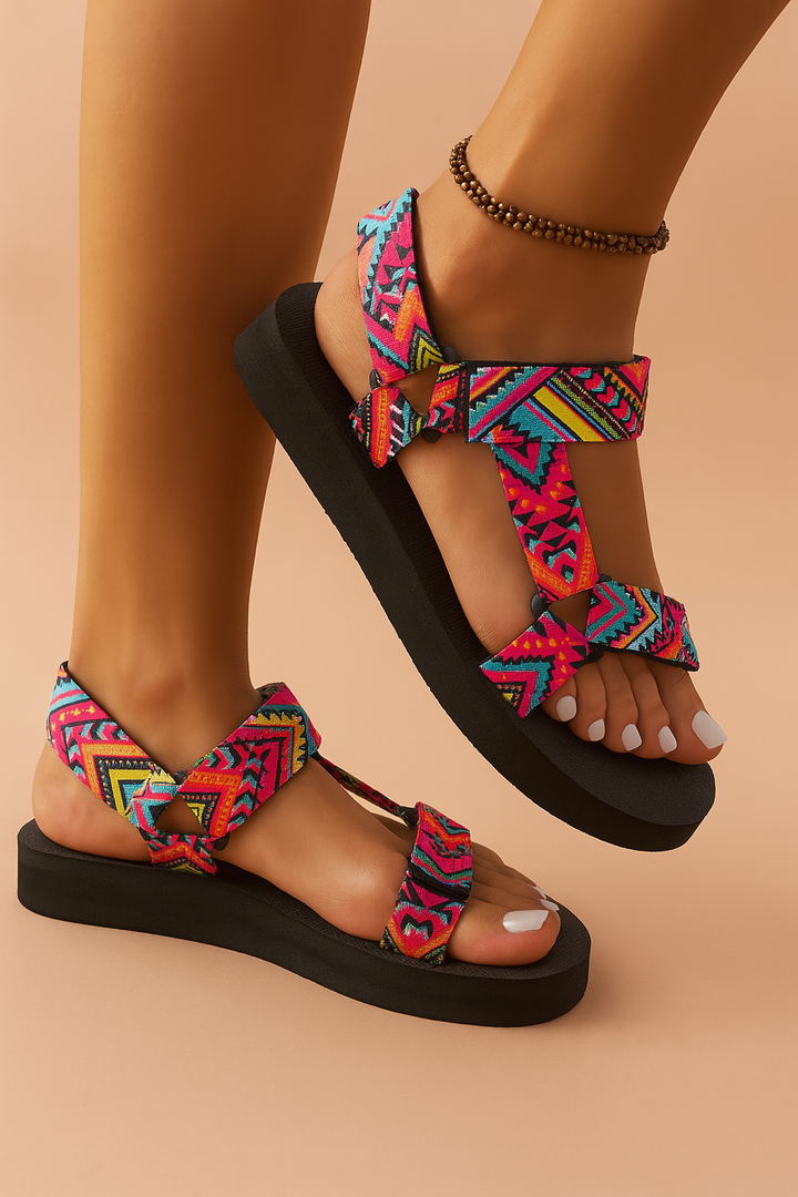 Comfortable women's open-toe summer sandals with detailed ethnic patterned colorful straps, great vacation shoes.