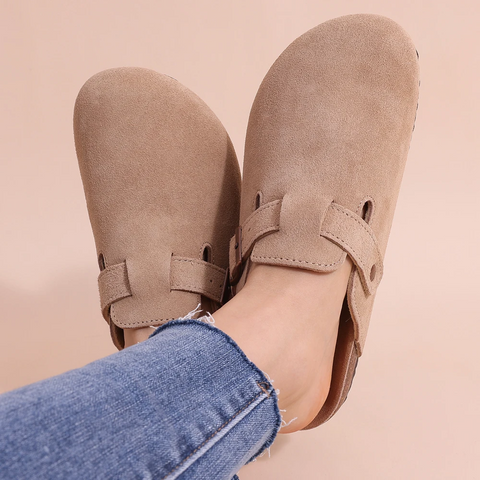 Orthopedic women's slip-on slippers offering optimal arch support & pressure relief for daily comfort.