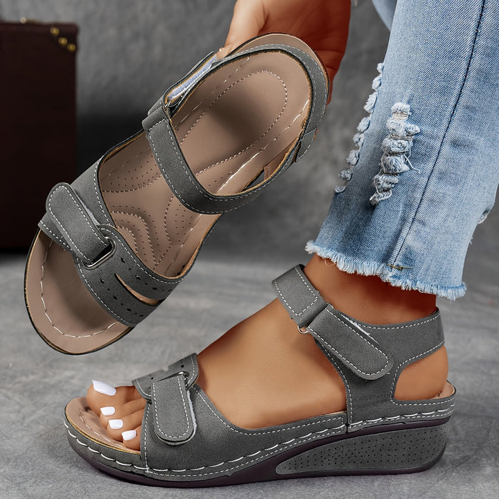 Women's walking sandals with comfort features and adjustable straps. Perfect lightweight, open-toe everyday footwear.