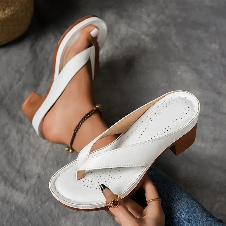 Women's comfort sandals with arch support for all-day wear. Supportive, slip-on design for casual summer fashion.