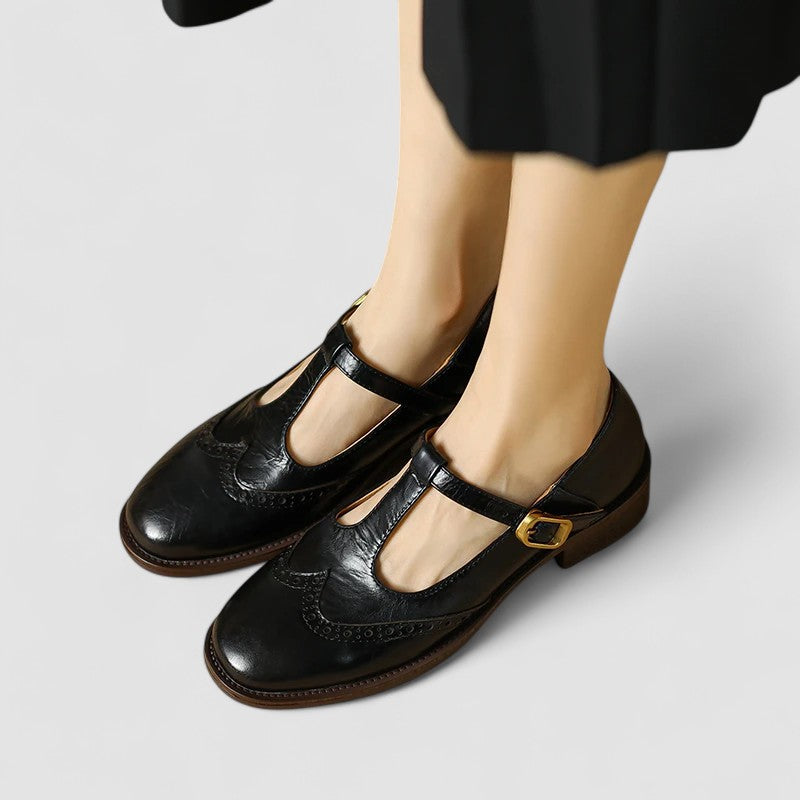 Black Mary Jane flats, comfortable and stylish women's slip-on shoes for casual wear.