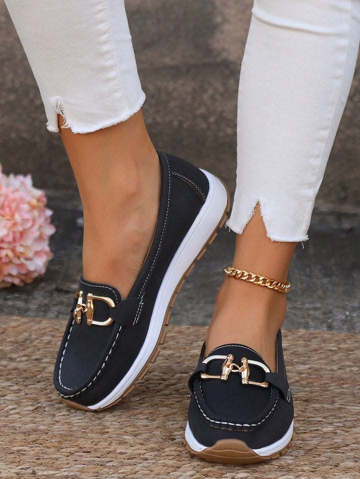 Women's comfortable black flat buckle loafers with slip-resistant sole, side view
