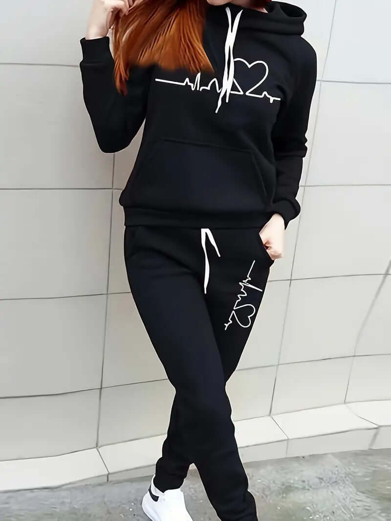 Women's athletic two-piece set; comfy hoodie & pants ideal for jogging, gym, or casual outings.