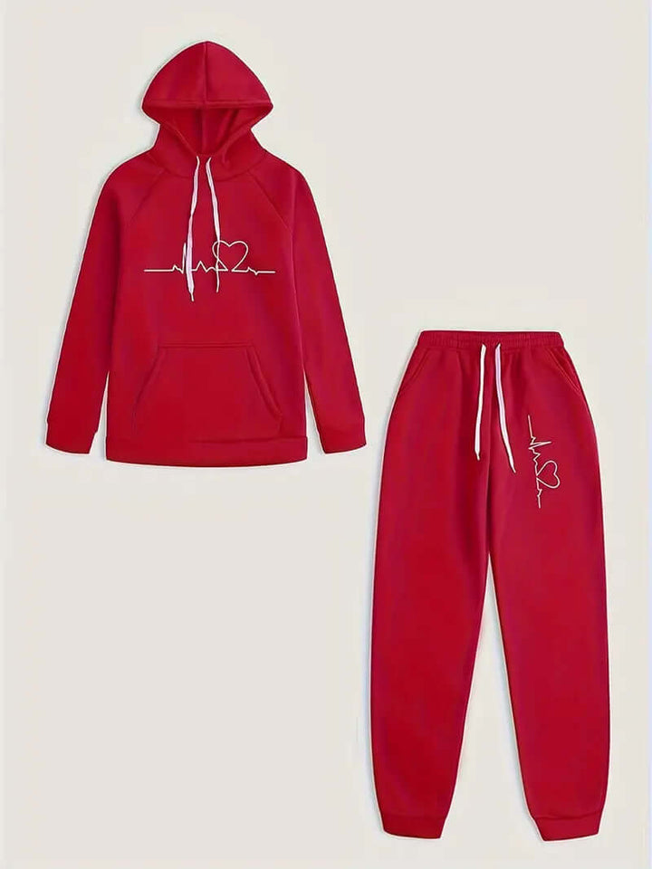 Women's sportswear set with cozy hoodie and matching athletic pants. Cotton blend for comfort.
