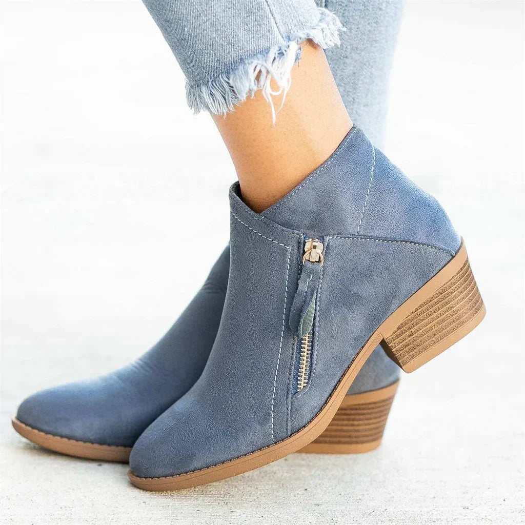 Stylish women's ankle boots with side zipper, perfect for everyday comfort & versatile winter outfits. Non-slip design.