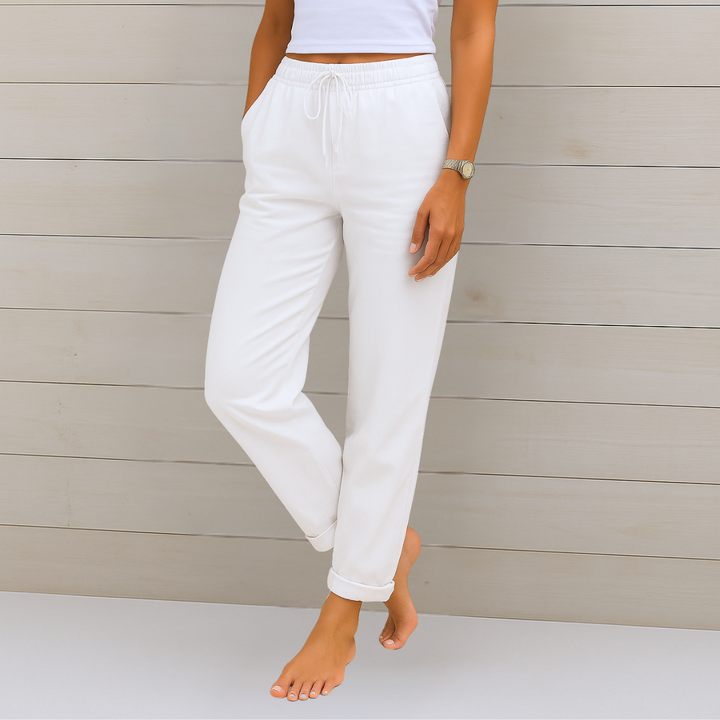 Versatile women's flowy trousers featuring an elastic waist, perfect for casual chic summer & travel.