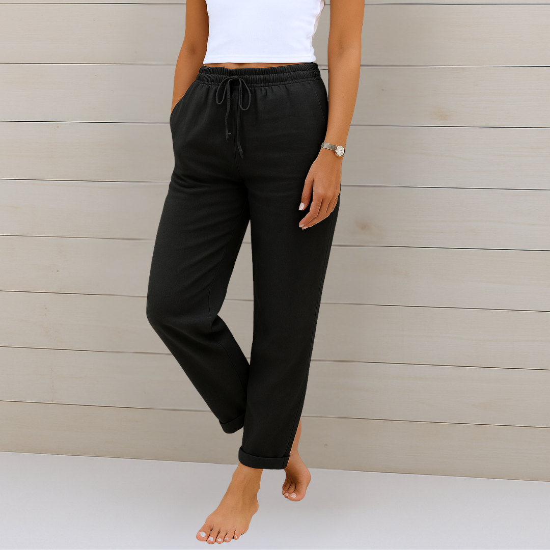 Neutral flowy women's pants with elastic waist, offering ultimate comfort and versatile everyday fashion.
