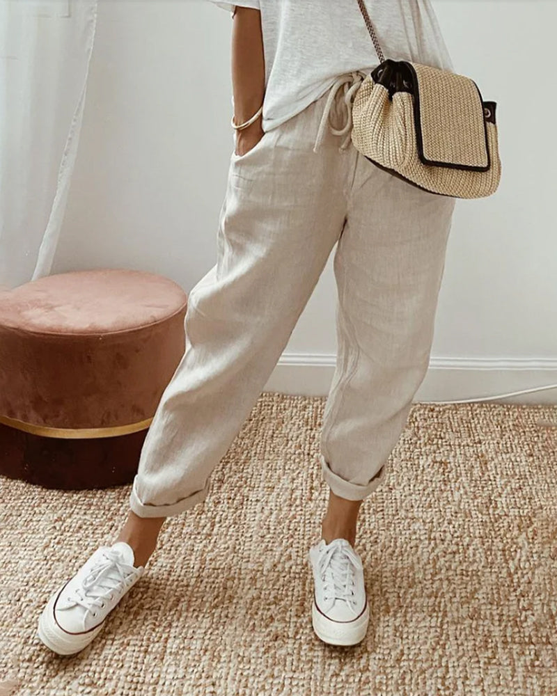 Women's comfortable high-waist trousers, perfect for casual wear. Lightweight & versatile stretch waist pants.