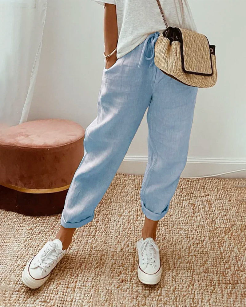 Casual women's high-waist summer trousers with a comfortable stretch waist. Lightweight & versatile everyday pants.
