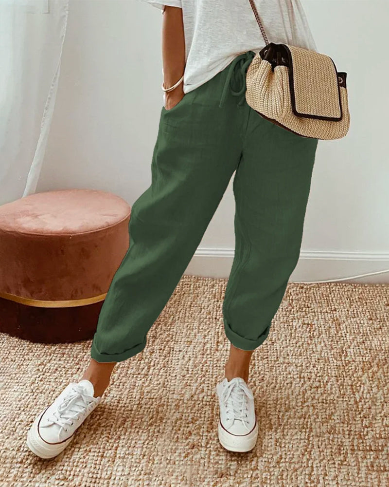Versatile women's high-waist trousers, blending casual comfort with elegant style. Perfect for office or summer.