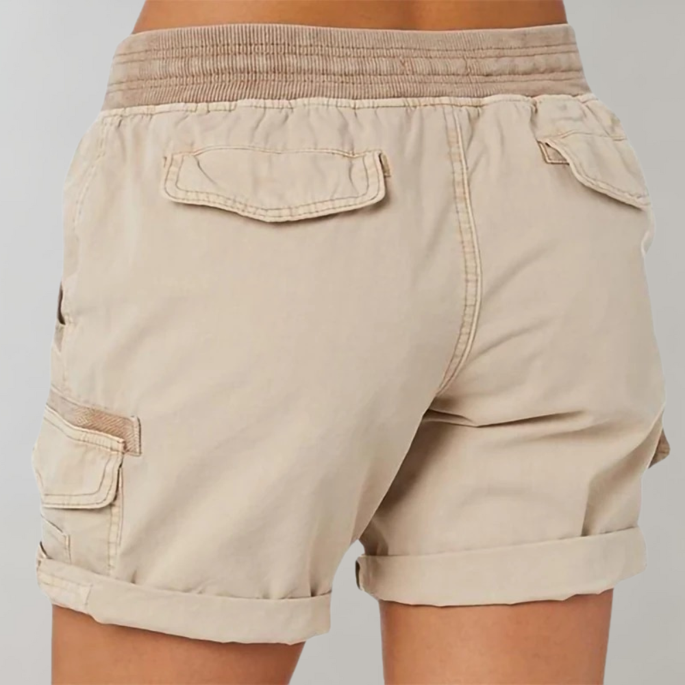 Red women's casual cargo shorts featuring an elastic waist for comfort and style, great for outdoor activities.