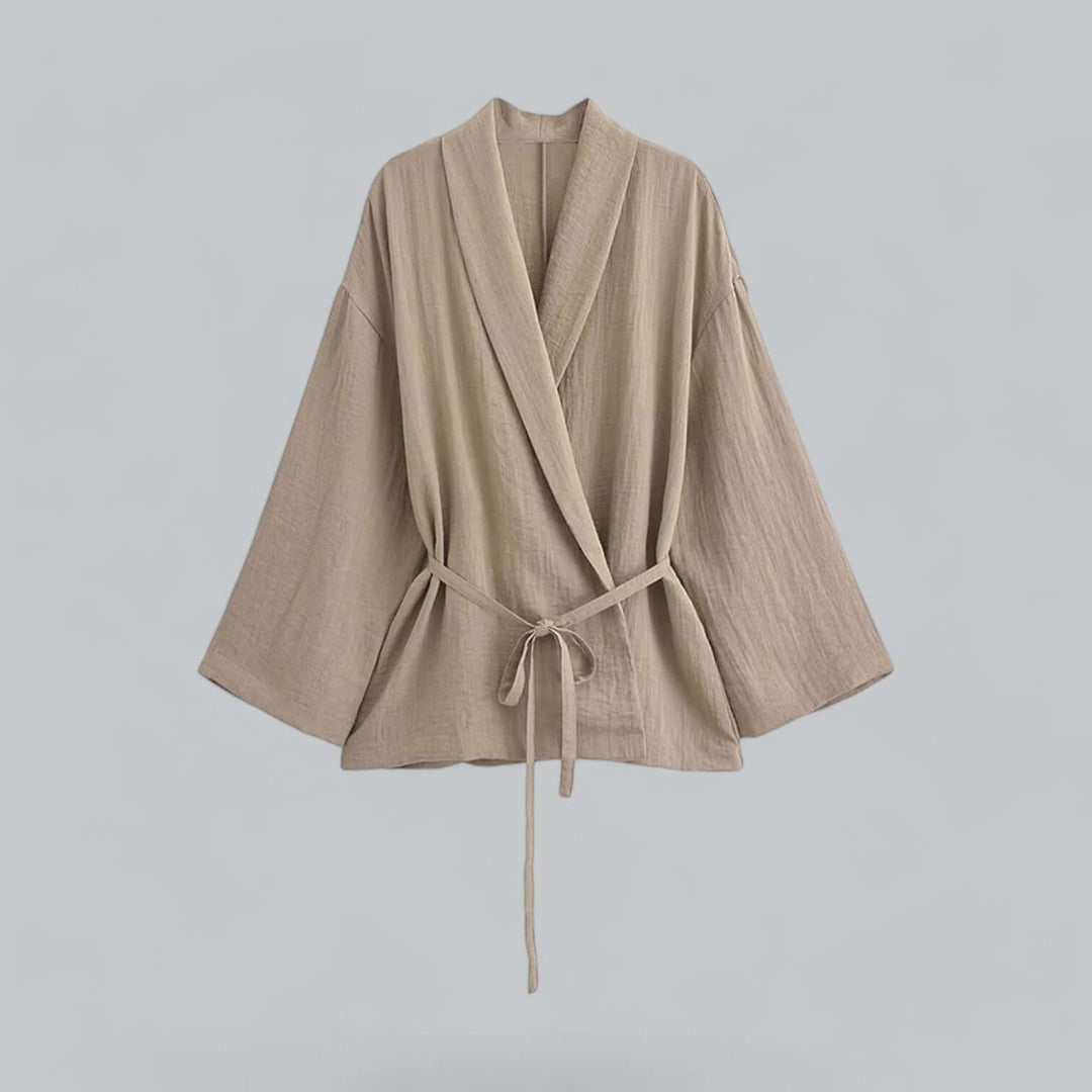 Elegant women's grey linen blend co-ord set with wide-leg trousers, a versatile summer outfit.