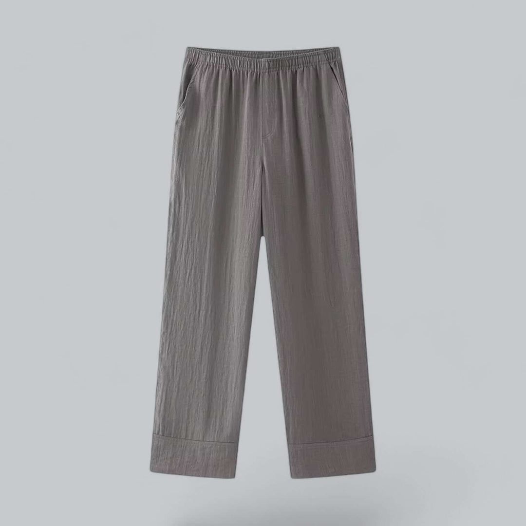 Women's navy blue linen blend casual chic outfit, featuring a comfy top and wide-leg trousers.
