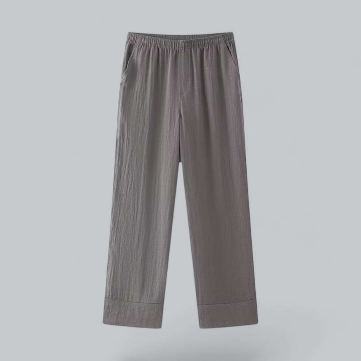 Women's navy blue linen blend casual chic outfit, featuring a comfy top and wide-leg trousers.