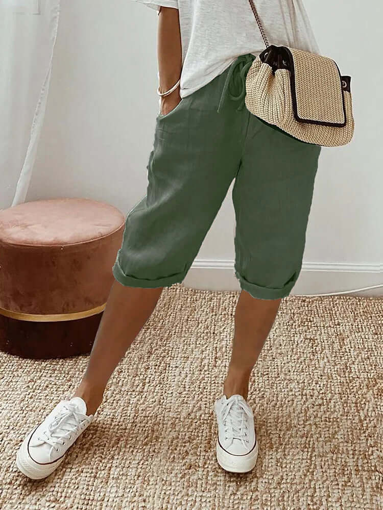 Soft, casual women's knee-length drawstring pants for comfortable everyday wear or summer relaxation.