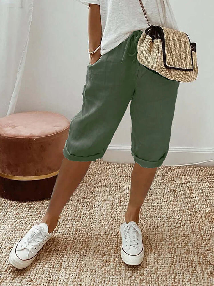 Soft, casual women's knee-length drawstring pants for comfortable everyday wear or summer relaxation.