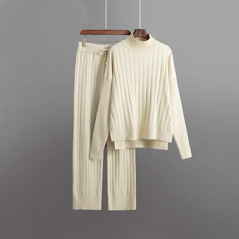 Women's comfortable ribbed knit two-piece lounge set with turtleneck and relaxed fit trousers, perfect for cozy style.
