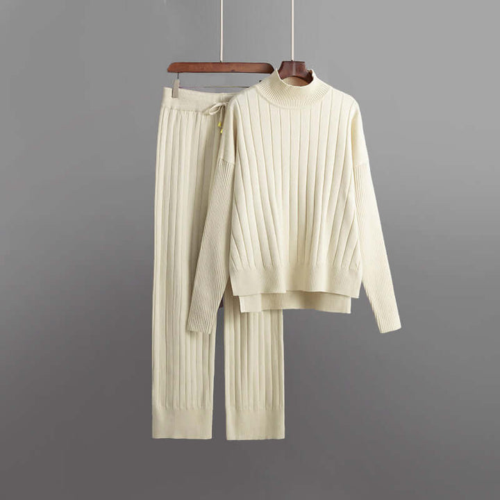 Women's comfortable ribbed knit two-piece lounge set with turtleneck and relaxed fit trousers, perfect for cozy style.