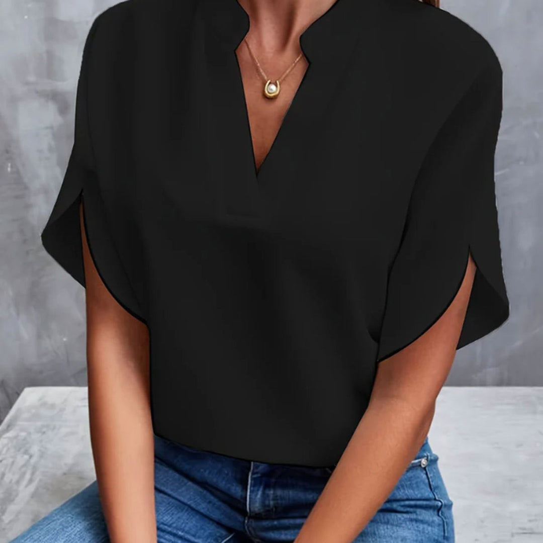 Chic women's short sleeve summer blouse. Comfortable & stylish top for everyday and casual occasions.