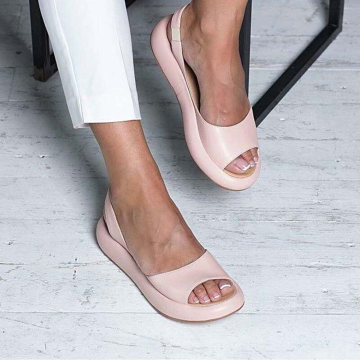 Women's comfortable slip-on summer sandals with flexible elastic straps, perfect for beach or casual wear.