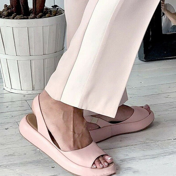 Beige microfiber women's slip-on sandals, ideal for everyday comfort and summer vacation shoes.