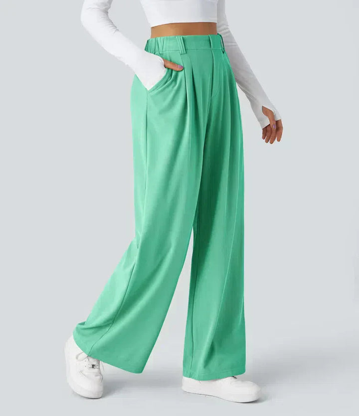 Side profile of women's versatile stretch trousers, highlighting sleek silhouette for flexible style & comfort.