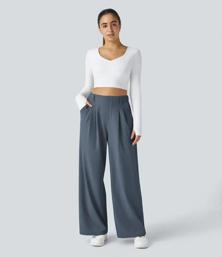 Women's stretch trousers paired with a stylish top, demonstrating versatile casual & formal styling options.