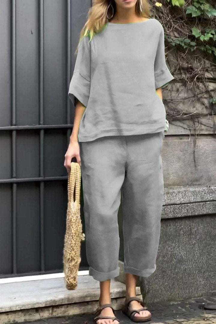 Relaxed fit two-piece loungewear set for women, featuring a stylish shirt and matching pants.