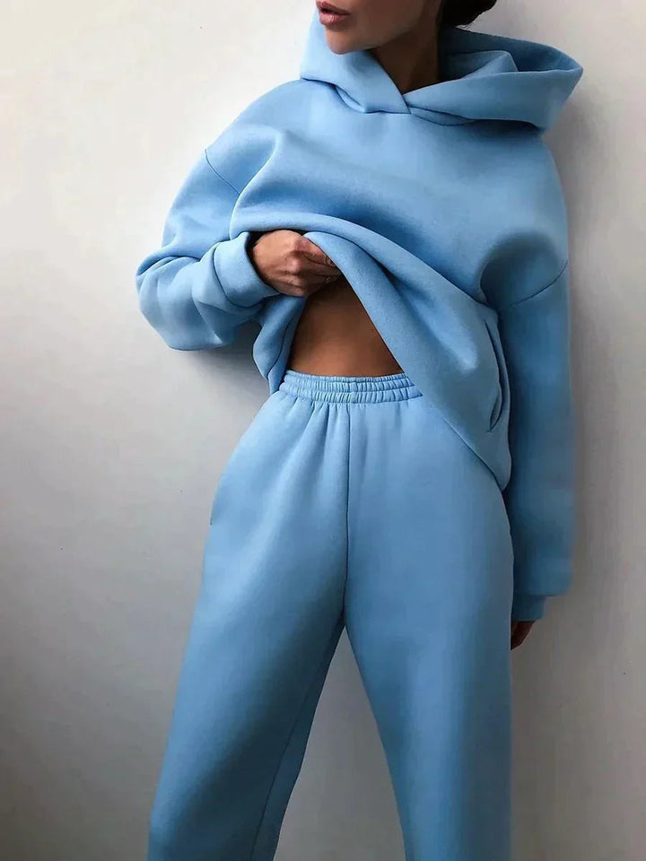 Women's comfortable two-piece jogging set with hoodie. Ideal for activewear, loungewear, or casual wear.