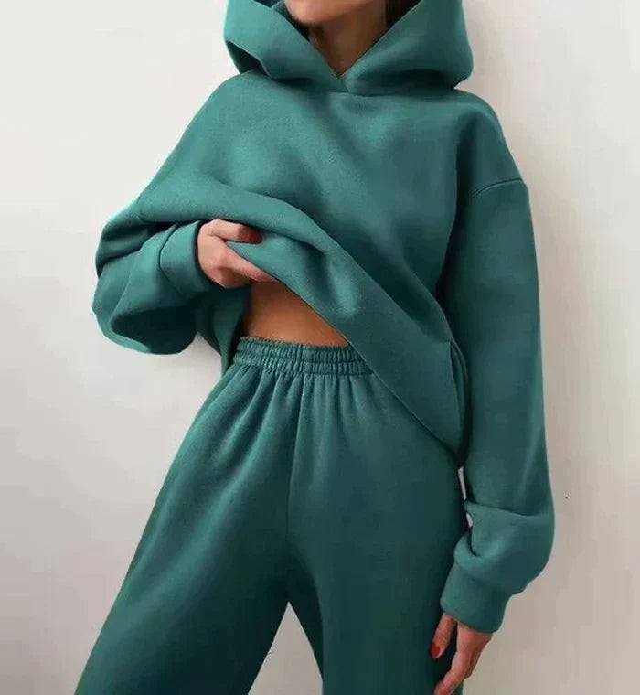 Women's versatile two-piece jogging set. Comfortable hoodie & pants for casual, active, or loungewear.