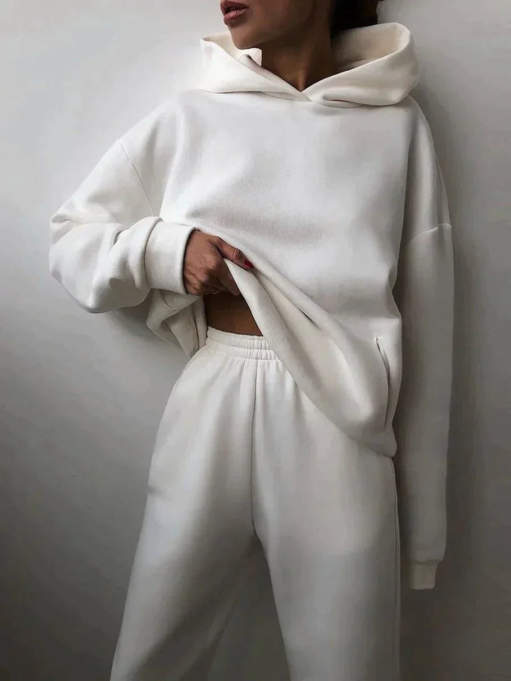Women's casual two-piece set, featuring a comfortable hoodie & joggers. Perfect for loungewear.