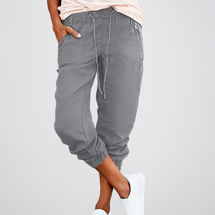 Stylish women's utility cargo pants with multiple pockets, ideal for spring & autumn fashion. Comfortable relaxed fit.
