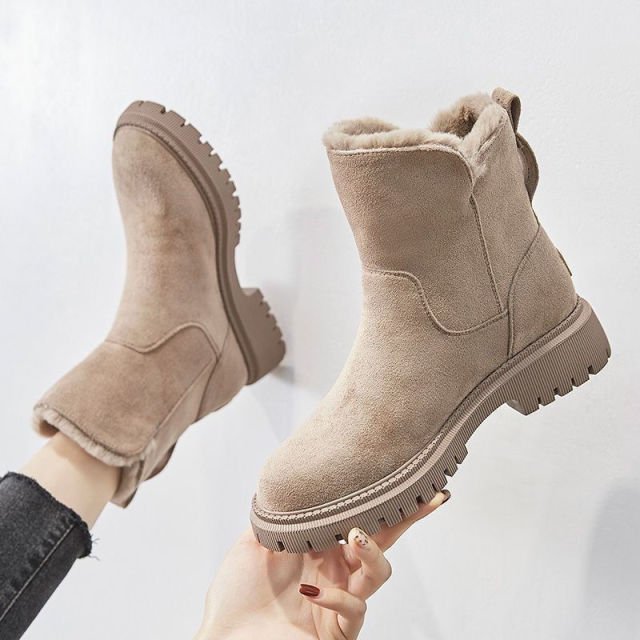 Slip-resistant women's snow boots, warm and waterproof, perfect for cold weather comfort.