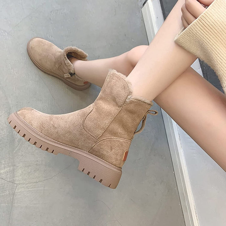 Stylish & warm women's winter boots, comfortable for casual wear and outdoor cold.