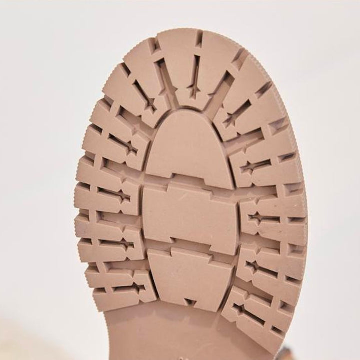 Durable women's winter boots, slip-resistant soles & warm lining for snow and ice.