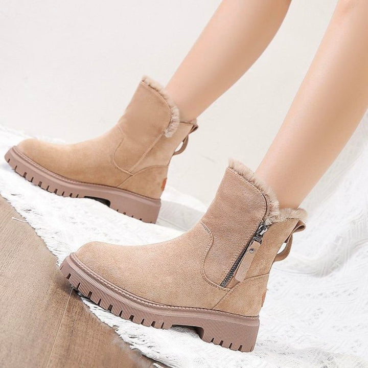 Cozy women's cold weather boots, comfortable and waterproof, ideal for daily winter wear.