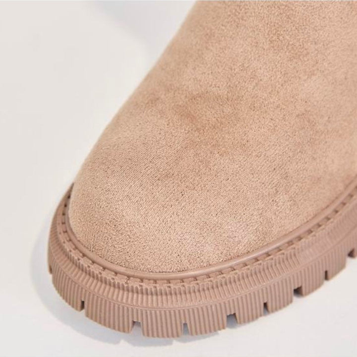 Outdoor women's boots, warm, comfortable, and slip-resistant for snowy and icy conditions.