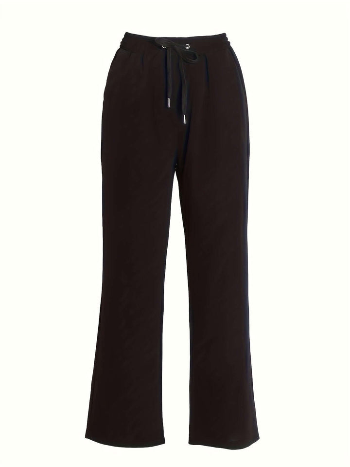 Casual women's wide-leg drawstring pants, offering comfort and style with useful pockets, versatile for daily outfits.