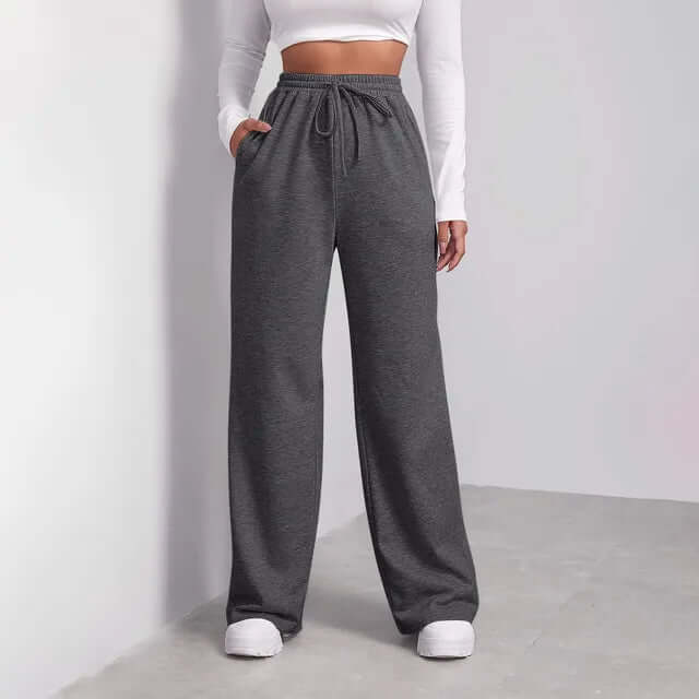 Casual women's wide-leg pants, perfect for summer. Features a comfortable drawstring waist and relaxed fit.