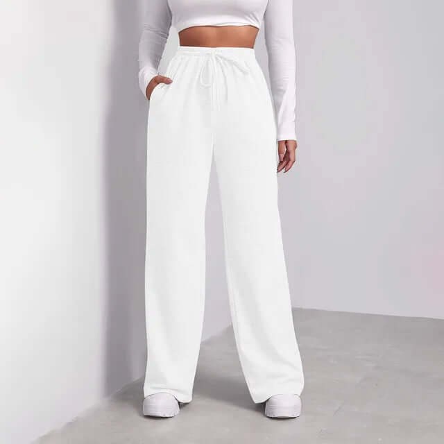 Full shot of women's comfortable wide-leg drawstring trousers, showing the relaxed fit and elegant drape.