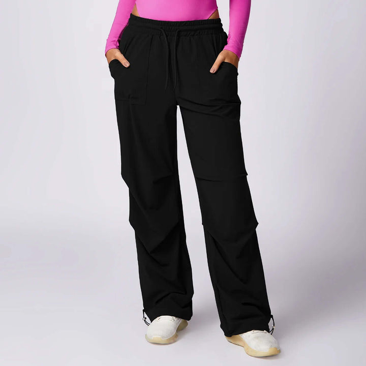 Chic women's wide-leg pants featuring an elastic waist and breathable fabric for ultimate comfort.