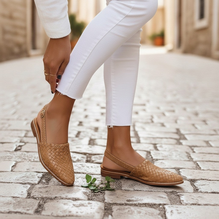 Chic women's woven loafers, offering comfortable slip-on style with a cushioned insole for casual or elegant ensembles.