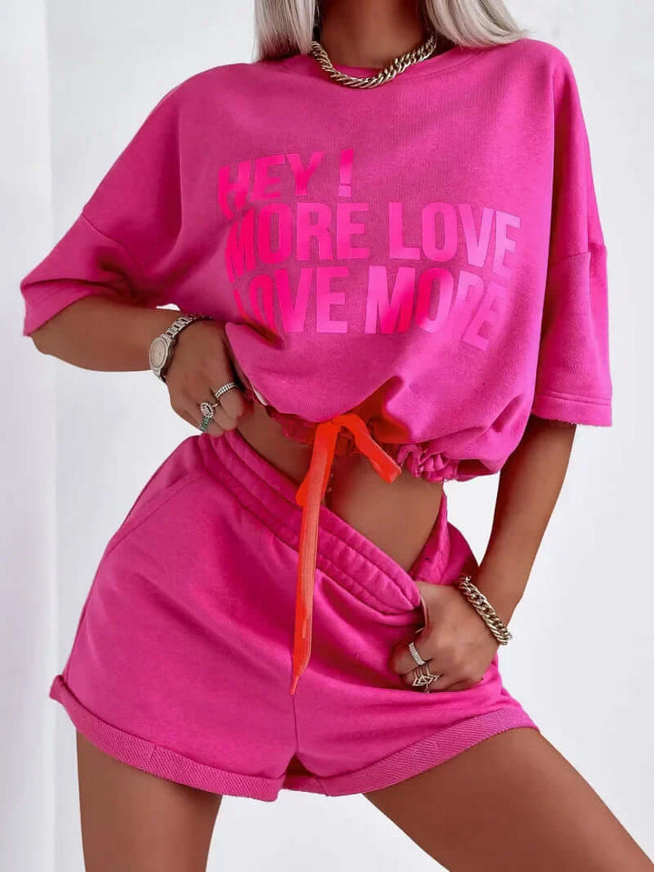 Women's versatile rose red two-piece set: a comfortable crop top and shorts, ideal for sleep, lounge, or summer.