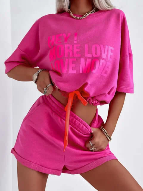 White comfy women's lounge set, a two-piece outfit with a crop top and shorts, great for summer casual wear.
