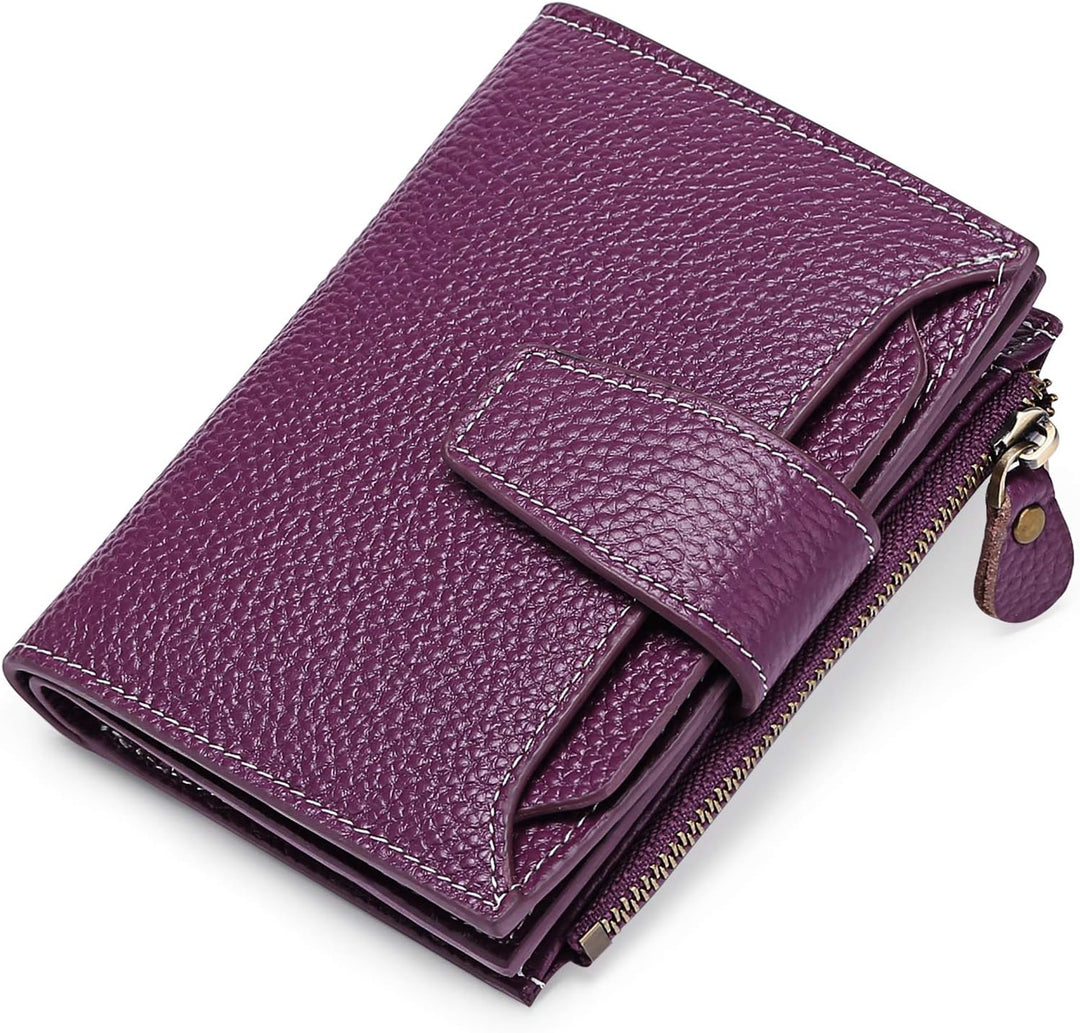 Women's multi-functional compact leather wallet, secure RFID blocking for travel.