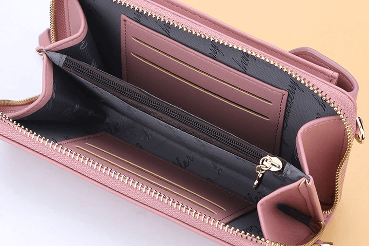 Sophisticated compact PU leather crossbody bag for women, practical & chic, with adjustable strap.