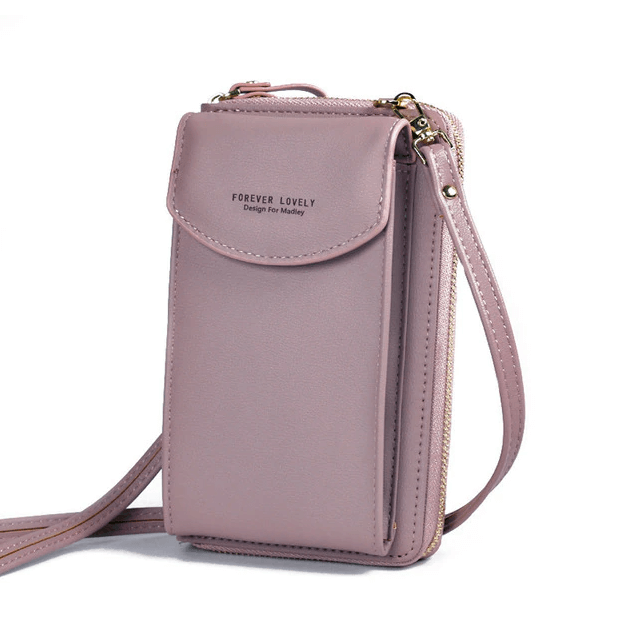 Essential women's compact PU leather crossbody bag, offering style & convenience, adjustable strap.