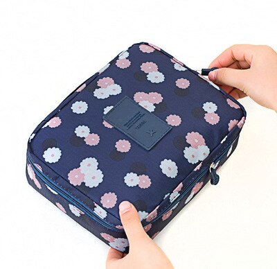 Side view of women's compact waterproof makeup travel organizer, durable & easy to clean material.